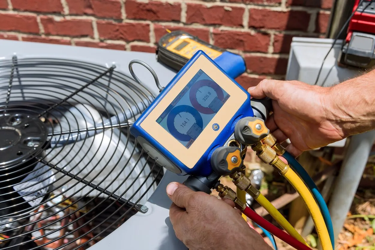 HVAC technician performing a service inspection