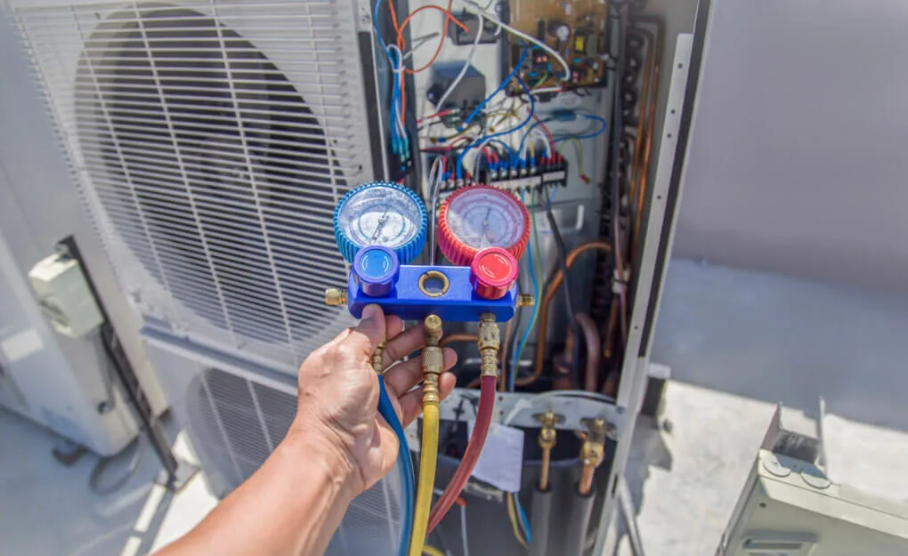 HVAC technician working on a commercial job