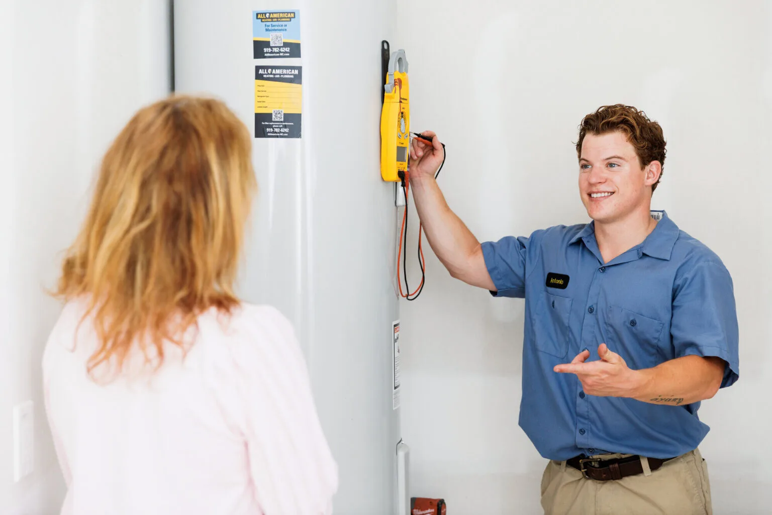 Water heater service consultation with a homeowner