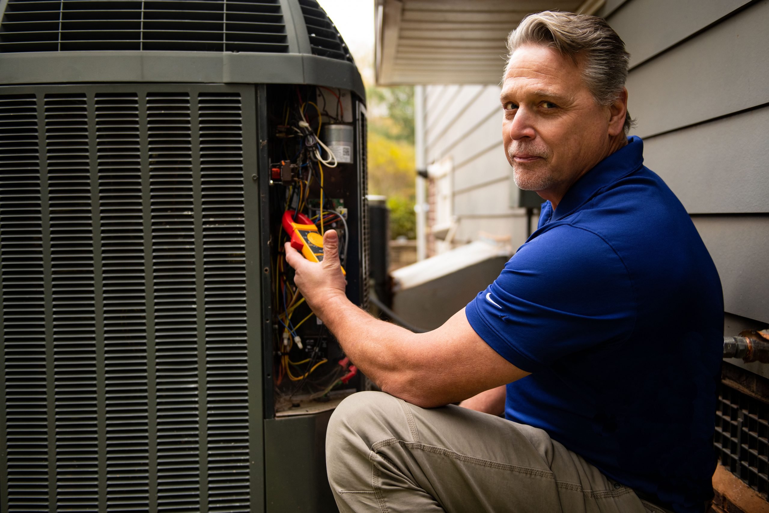 Man working on Air Conditioner